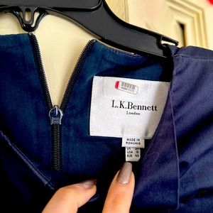 Pre owned navy blue structured pleat dress. Sensible and elegant. Sharp.